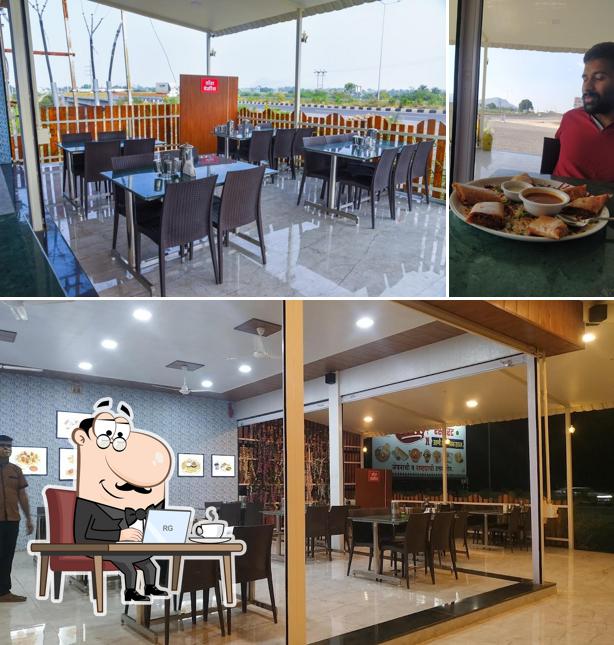 The interior of Atharva Family Restaurant Pure Veg & Udupi Management