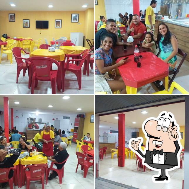 O interior do Gênios Das Pizzas