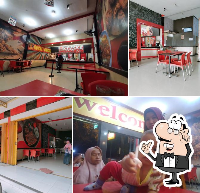 Take a seat at one of the tables at Rocket Chicken Tembelang