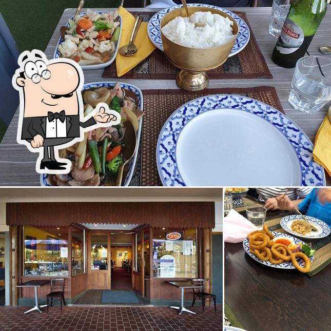 Взгляните на этот снимок, где видны внутреннее оформление и столики в Thai Royal Restaurant