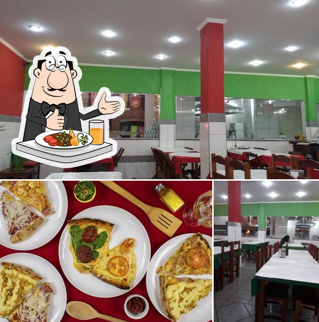 O Restaurante e Pizzaria União se destaca pelo comida e mesa de jantar