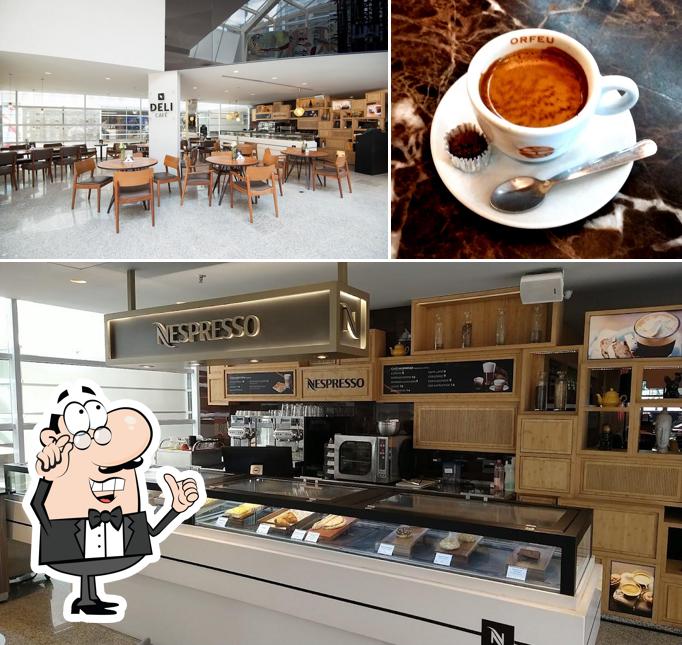 Entre diferentes coisas, interior e bebida podem ser encontrados no Deli Café Nespresso- Cafeteria, lanches rápidos e produtos TO GO