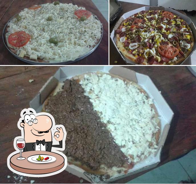 Comida em Pizzaria Caprichosa