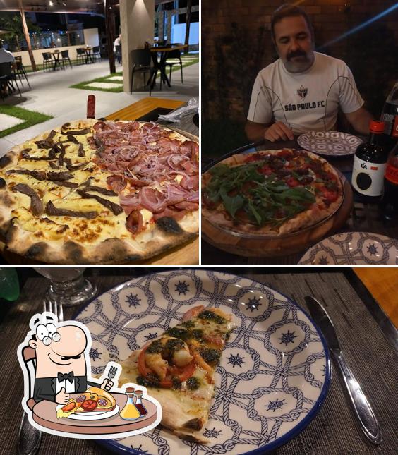 Consiga pizza no La Caravella Pizzeria