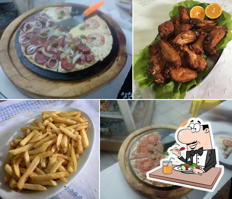 Comida em Pizzaria da Rê