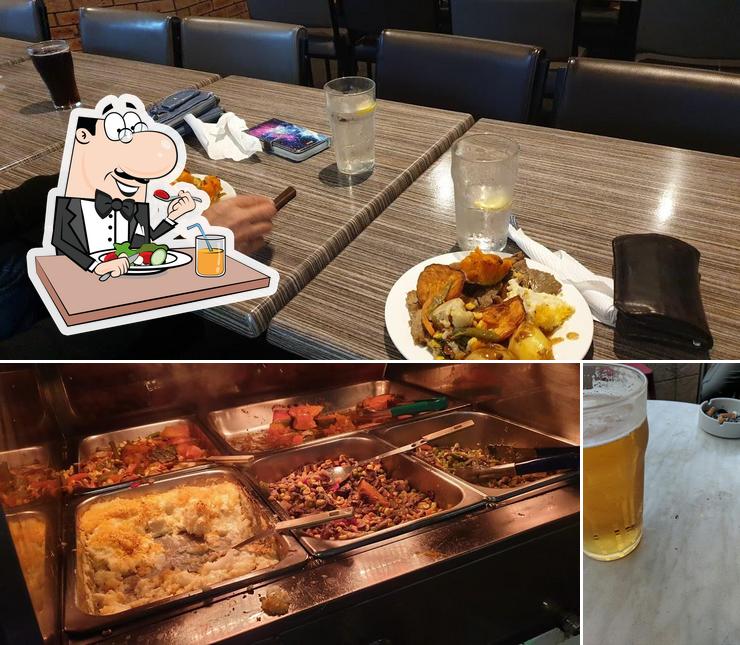 Take a look at the photo displaying food and beer at Madora Bay Tavern