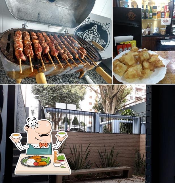 Confira a foto ilustrando comida e exterior no A Caverna da Pizza SBC