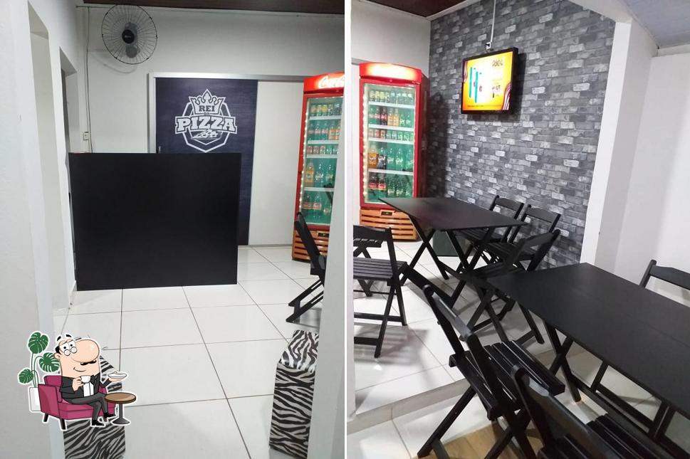 O interior do Rei da Pizza