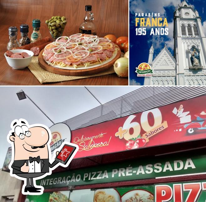 Entre diferentes coisas, exterior e pizza podem ser encontrados a Integração Pizzas Pré Assada