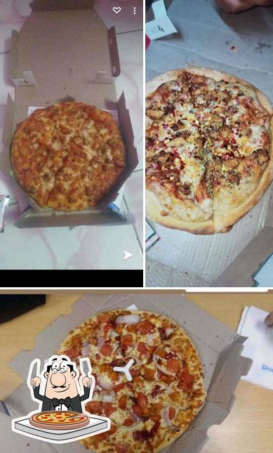 Pick pizza at Domino's Pizza