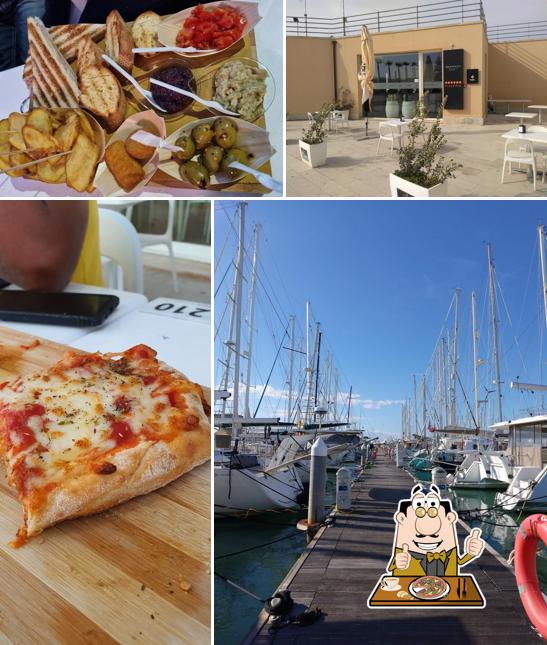 Scegli una pizza a Marina's Lounge Bar
