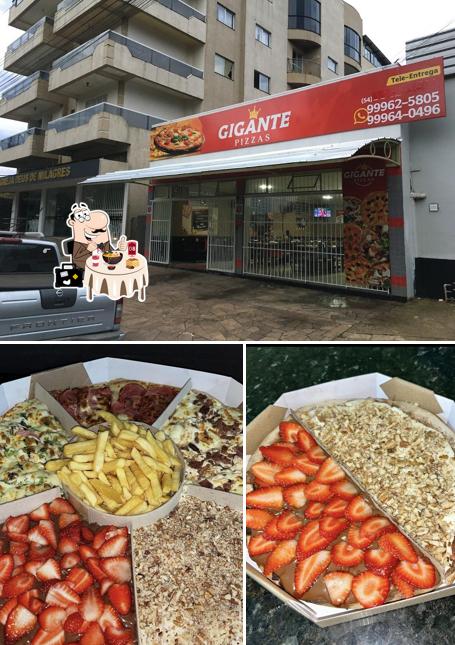 Dê uma olhada a foto apresentando comida e exterior no GIGANTE PIZZAS