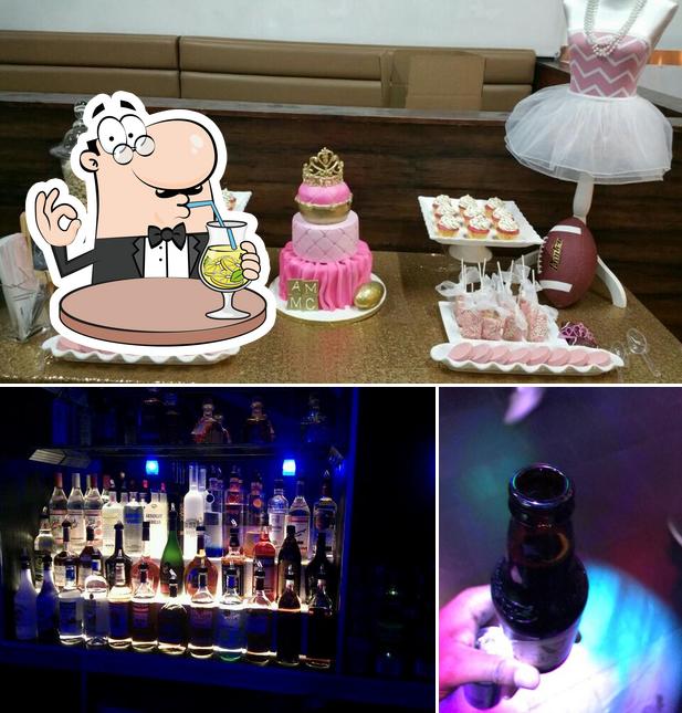 This is the image depicting drink and cake at The Garage Bar And Lounge