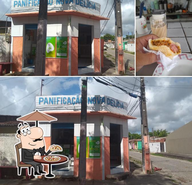 A imagem a Panificação Nova Delicia’s exterior e comida