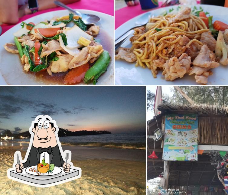 Check out the image depicting food and exterior at Pit Thai Beach Restaurant