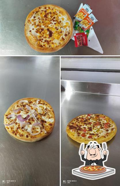 Pick pizza at New Pizza King