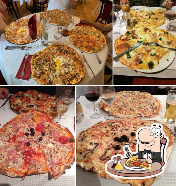 Choisissez des pizzas à Pizzeria-Restaurant La Romantica Sàrl