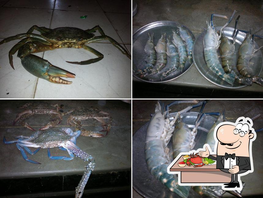 Order various seafood dishes offered by Bidesh Ghar Restaurant