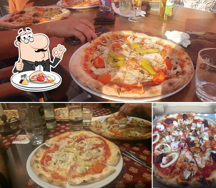 Try out pizza at Cavallino (Ristorante, Pizzeria)