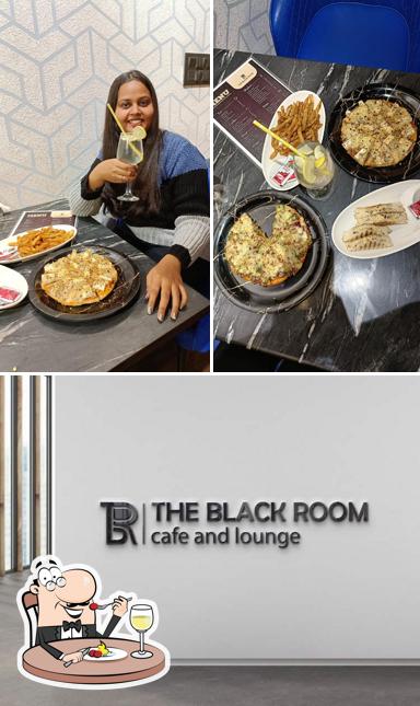 The picture of food and interior at Tbr gwalior The black room