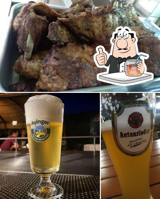 La foto di bevanda e la carne da Bavaria Garda - Birreria Pizza & Stube