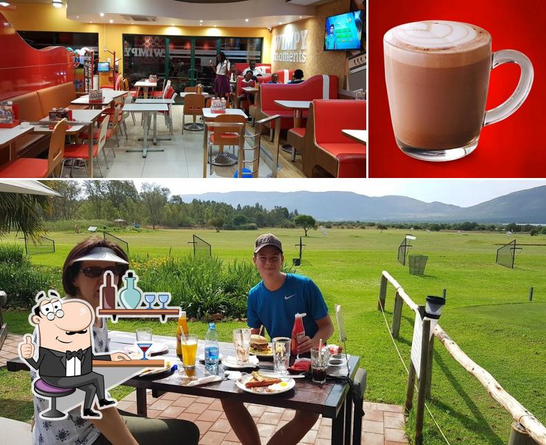 Check out the photo displaying interior and beverage at Wimpy