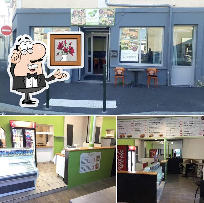 The interior of Happy Food (Sandwich, Pizza a 8 € Livraison gratuit a partir de 18 € ,couscous sur commande)