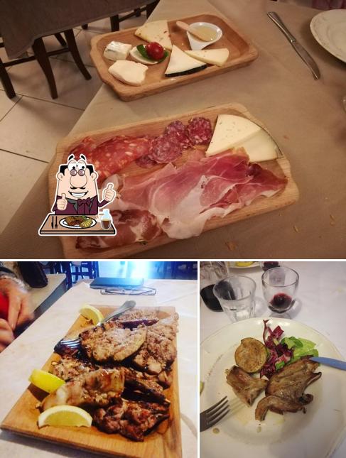 Prenditi i un pasto a base di carne a Pizzeria I Rintocchi