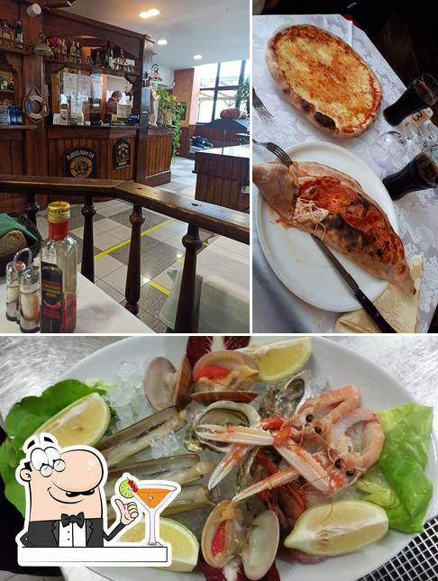 La foto di bevanda e frutti di mare da Ristorante Pizzeria La Kambusa da Gigi