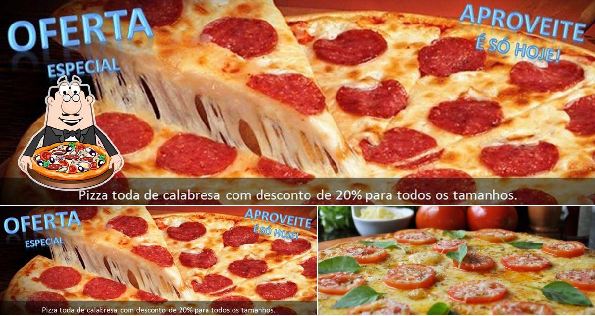 Experimente pizza no Pizzaria May Calzone Delivery