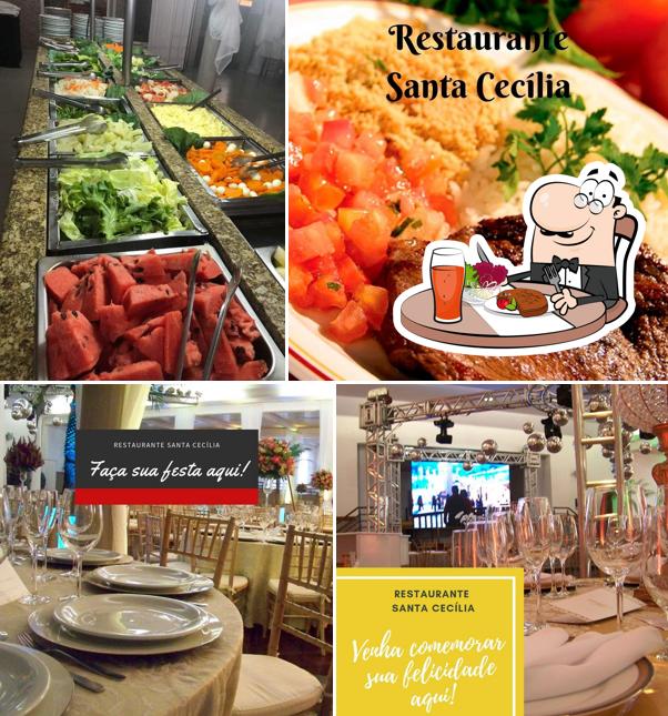 A foto a Sociedade e Restaurante Santa Cecília’s mesa de jantar e comida