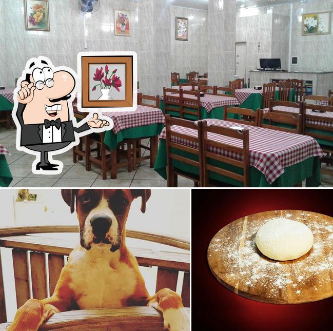 Entre diversos coisas, interior e comida podem ser encontrados a Pizzaria do guaita