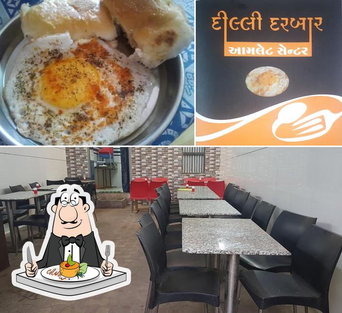 Among different things one can find food and interior at DILLII DARBAR (OMELETTE) RESTAURANT