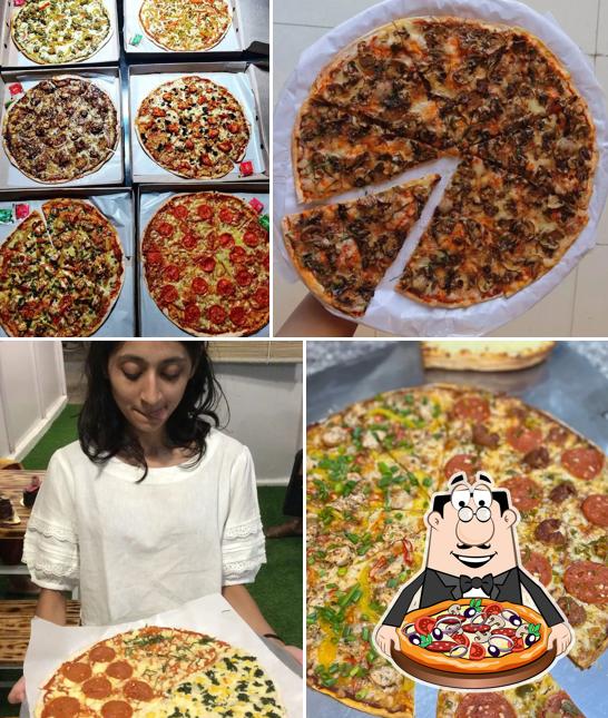 Try out pizza at Mighty Crust Pizzeria - Crafting Perfection, Serving the Best Pizza Nearby