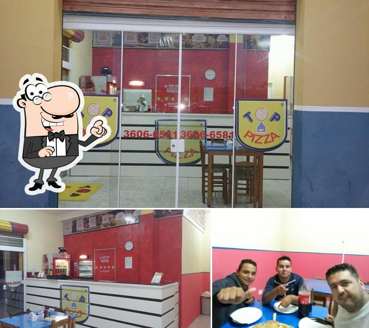 O interior do Top Pizza Maracanã