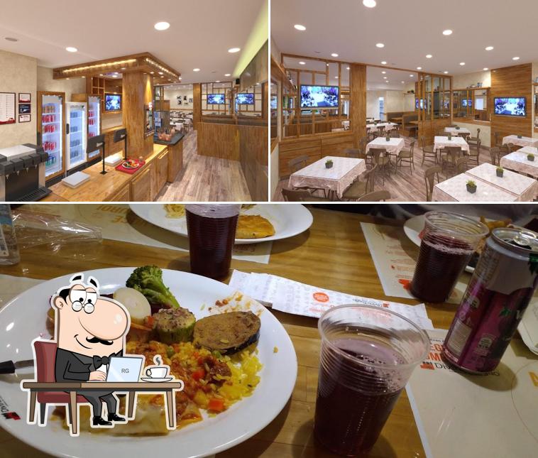 Confira a foto ilustrando interior e comida a Divino Fogão Extra Anchieta