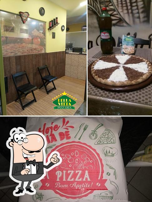 O interior do Pizzaria Della Vitta