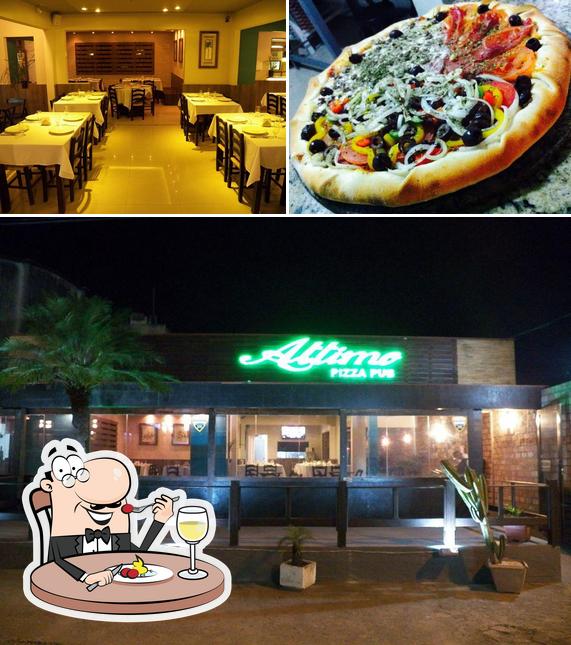 O Attimo PIZZA PUB se destaca pelo comida e interior