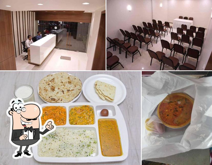 This is the image displaying interior and food at Pallav Foods