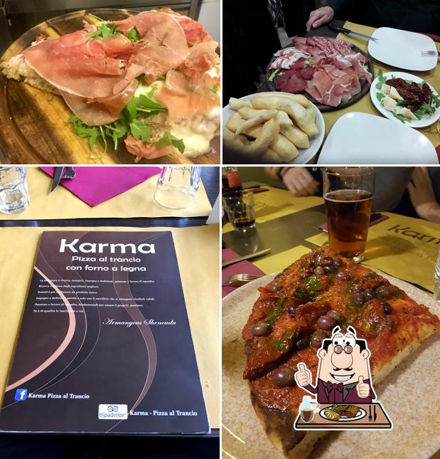 Prova i piatti di carne a Karma pizza al trancio con forno a legna