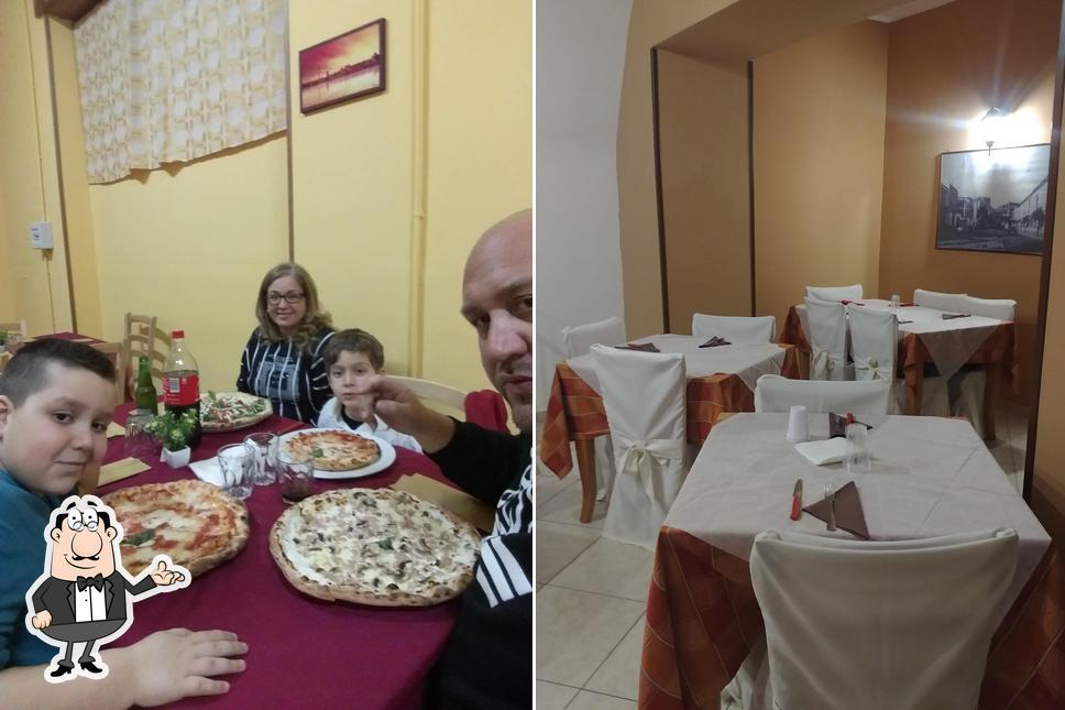 Dai un'occhiata agli interni di Arte Pizza