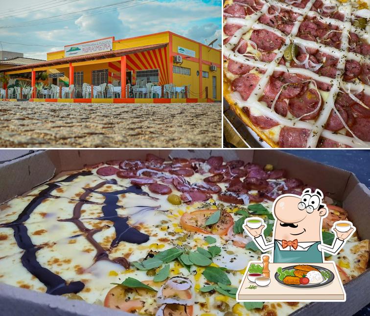 A imagem da comida e exterior a Pizzaria Roraimeira