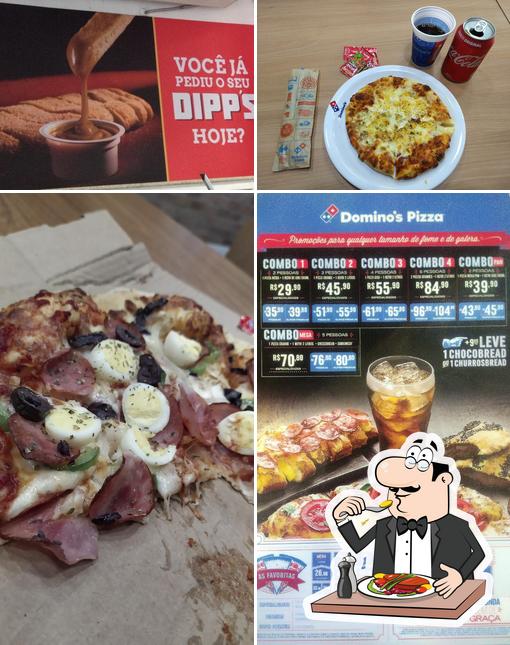 A imagem a Domino's Pizza’s comida e bebida