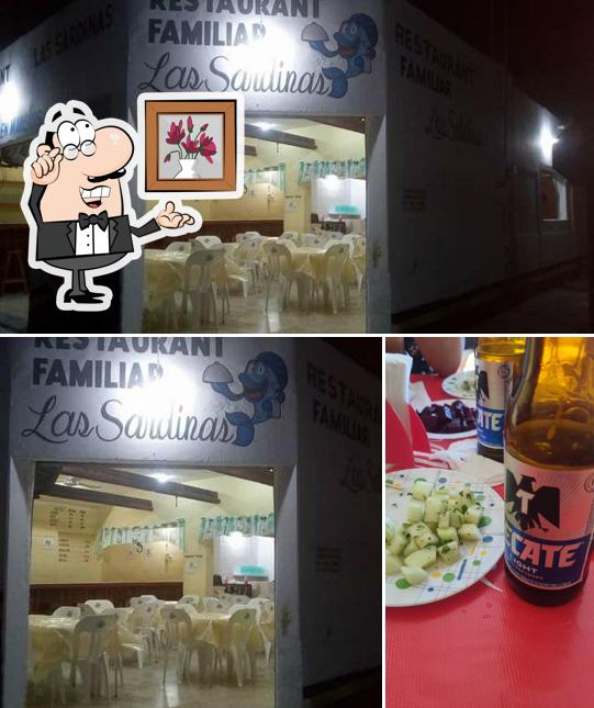 Mira las fotos que muestran interior y cerveza en Restaurant Familiar Las Sardinas