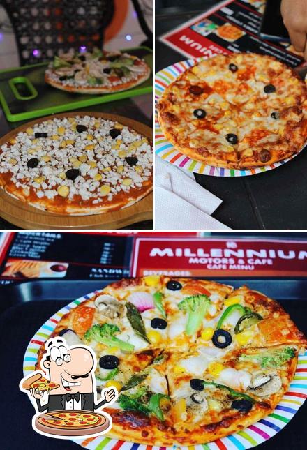 Get pizza at Millennium Motors & Cafe