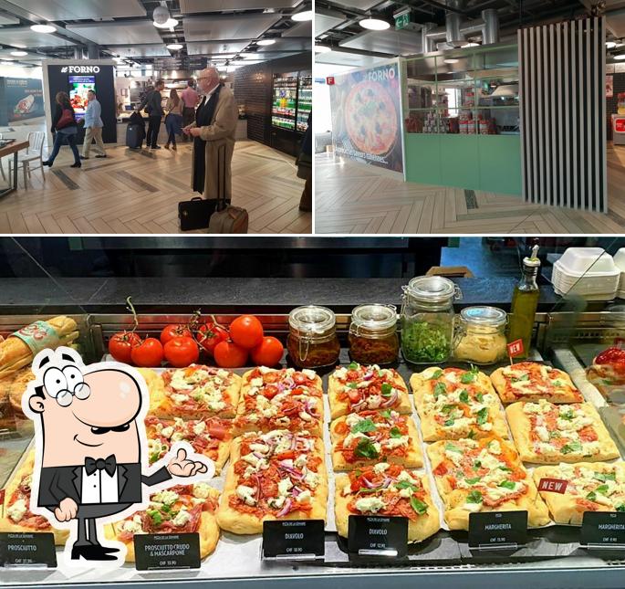 Guarda la foto che mostra la interni e pizza di Il Forno Foodcourt Genève Aéroport