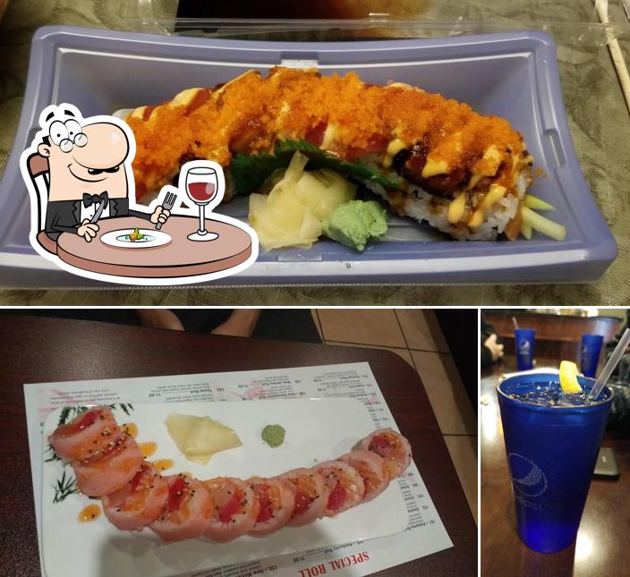 Take a look at the photo displaying food and beer at Kyoto Sushi