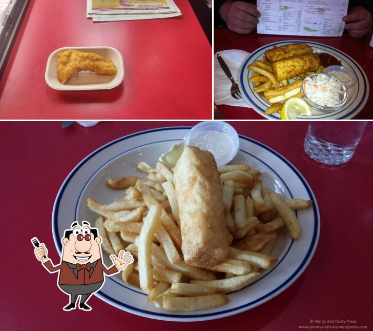 Jetez un coup d’oeil à l’image indiquant la nourriture et table à manger concernant The Sea House Fish and Chips