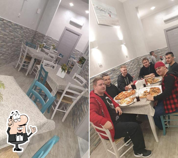 Dai un'occhiata agli interni di Pizzeria Gusti Siciliani