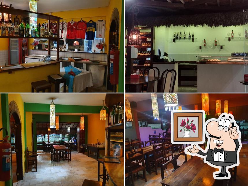 Veja imagens do interior do Lá Nostra Pizzaria e restaurante